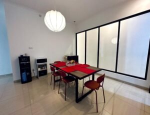 The dining room at Nuansa Swadarma Residence's 4-bedroom home exudes elegance and comfort. With ample seating and tasteful decor, it's an inviting space for shared meals and special occasions