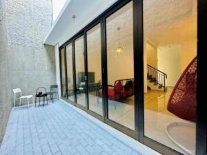 The patio and oudoor seating area | 4 Bedrooms Home in South Jakarta Permata Hijau Area